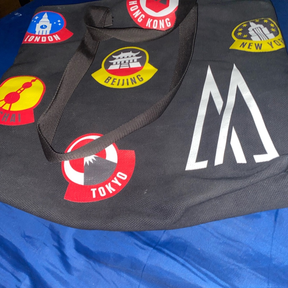 Moncler Black Tote Bag with Red, Yellow and White Travel Badge Graphics